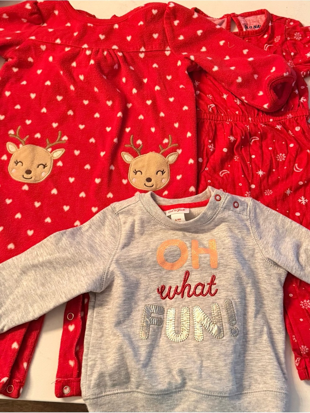 Three Christmas outfits for baby girl